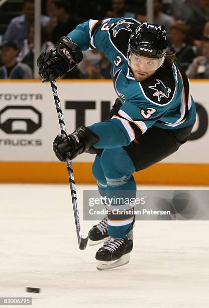 Douglas Murray of the San Jose Sharks passes the puck against the Dallas Stars during game five of the Western Conference Semifinals of the 2008 NHL...