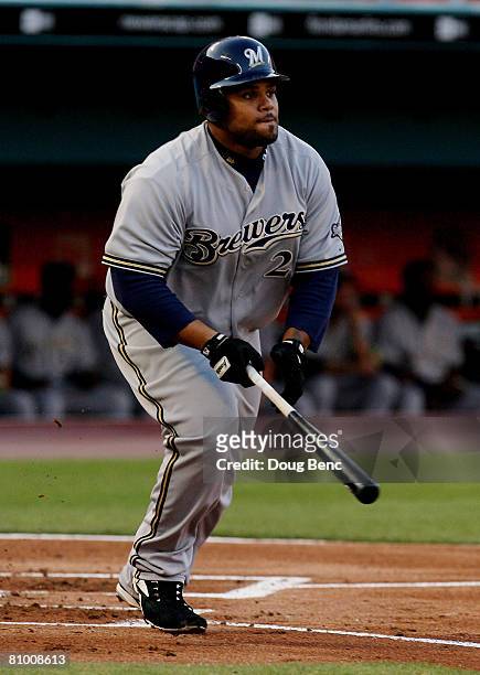 First baseman Prince Fielder of the Milwaukee Brewers follows his fly ball to right field while taking on the Florida Marlins at Dolphin Stadium on...