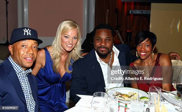 Entrepreneur Russell Simmons, TV personality Brooke Long, actor Malcolm-Jamal Warner and actress Regina King attend the USA TODAY Hollywood Hero...