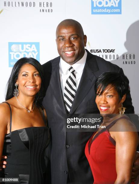 Former NBA player Earvin 'Magic' Johnson , his wife Cookie and actress Regina King arrive at the 3rd Annual "Hollywood Hero" Awards Gala honoring...