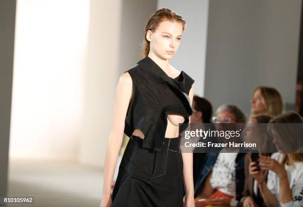 Model walks the runway at the Vladimir Karaleev show during the Mercedes-Benz Fashion Week Berlin Spring/Summer 2018 at Kaufhaus Jandorf on July 7,...