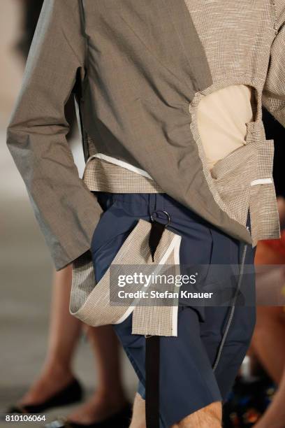 Model, fashion detail, walks the runway at the Vladimir Karaleev show during the Mercedes-Benz Fashion Week Berlin Spring/Summer 2018 at Kaufhaus...