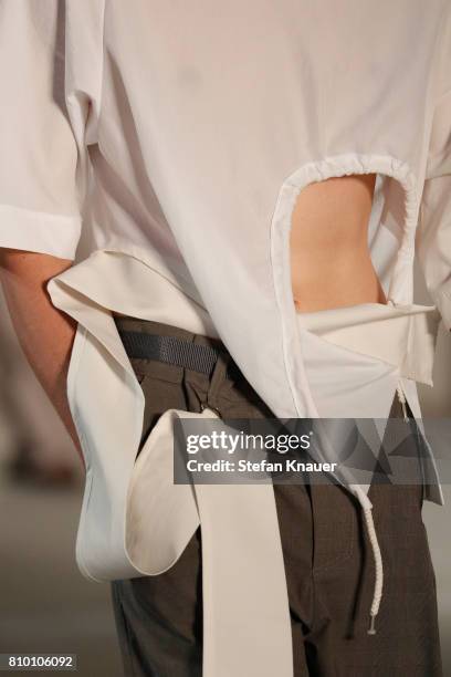 Model, fashion detail, walks the runway at the Vladimir Karaleev show during the Mercedes-Benz Fashion Week Berlin Spring/Summer 2018 at Kaufhaus...