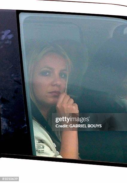 Pop star Britney Spears leaves the Los Angeles County Superior courthouse after a child custody status hearing on May 6, 2008. Spears has been locked...