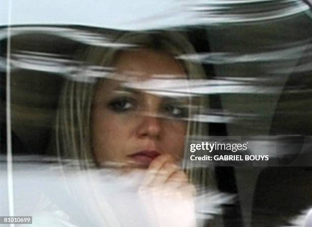 Pop star Britney Spears leaves the Los Angeles County Superior courthouse after a child custody status hearing on May 6, 2008. Spears has been locked...