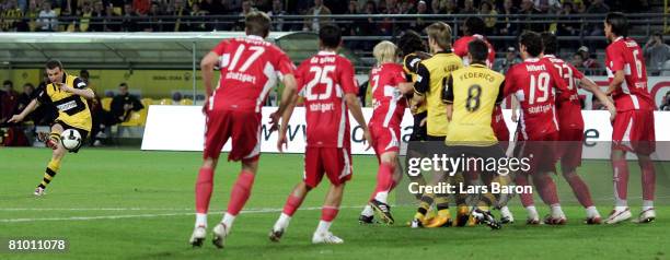 Alexander Frei of Dortmund scores the third goal during the Bundesliga match between Borussia Dortmund and VfB Stuttgart at the Signal Iduna Park on...