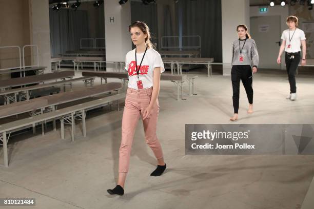 Models are seen backstage ahead of the Vladimir Karaleev show during the Mercedes-Benz Fashion Week Berlin Spring/Summer 2018 at Kaufhaus Jandorf on...