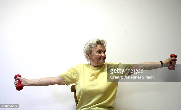 Ruth Roeder, inhabitant of the St.Michael Zentrum, residential home for the elderly, participates a physical fitness tra?ning session on May 7, 2008...