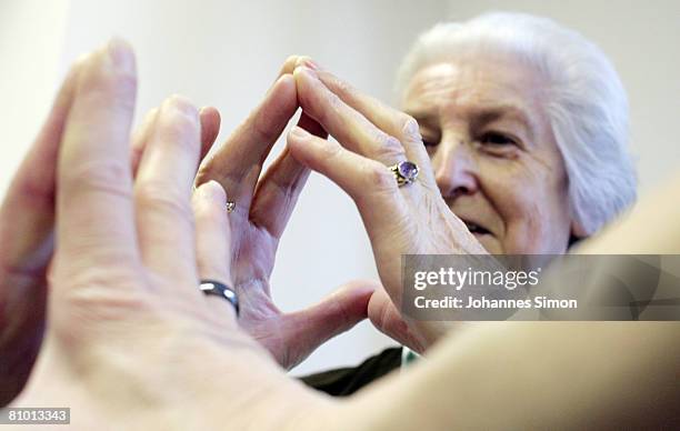 Anna Pappenberger, inhabitant of the St.Michael Zentrum, residential home for the elderly, participates a physical fitness tra?ning session on May 7,...