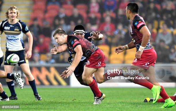 James Tuttle of the Reds gets a pass away during the round 16 Super Rugby match between the Reds and the Brumbies at Suncorp Stadium on July 7, 2017...