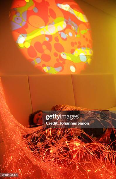 Anna Wirschnitzke, inhabitant of the St.Michael Zentrum, residential home for the elderly, relaxes in a light and sound room after a physical fitness...