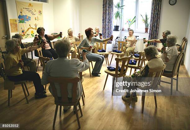 Inhabitants of the St.Michael Zentrum, residential home for the elderly, participates a physical fitness tra?ning session on May 7, 2008 in Weiden,...