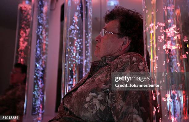 Anna Wirschnitzke, inhabitant of the St.Michael Zentrum, residential home for the elderly, relaxes in a light and sound room after a physical fitness...