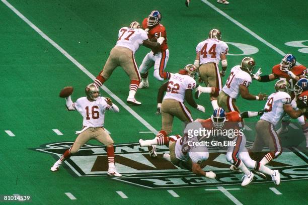 Quarterback Joe Montana of the San Francisco 49ers sets up to pass against the Denver Broncos in Super Bowl XXIV at the Superdome on January 28, 1990...