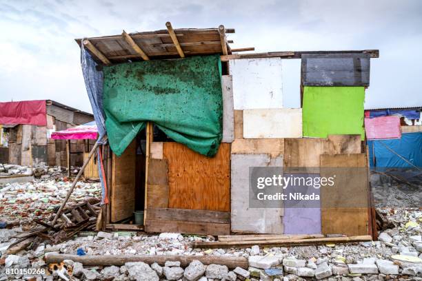 slum house in jakarta, indonesia - jakarta slum stock pictures, royalty-free photos & images