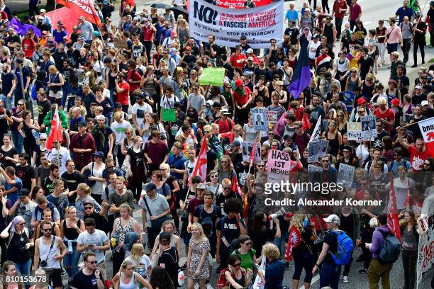 Protesters partcipate in a peaceful anti-G20 march on July 7, 2017 in Hamburg, Germany. Authorities are braced for large-scale and disruptive...