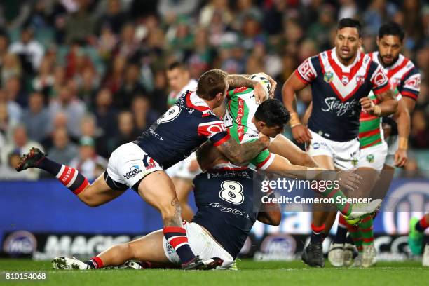 Bryson Goodwin of the Rabbitohs is tackled during the round 18 NRL match between the Sydney Roosters and the South Sydney Rabbitohs at Allianz...