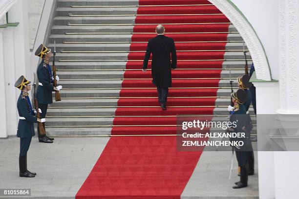 Outgoing Russian President Vladimir Putin, arrives at an inauguration ceremony for president-elect Dmitry Medvedev in Moscow's Kremlin on May 7,...