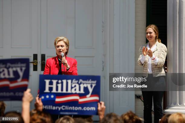 Democratic presidential hopeful U.S. Senator Hillary Clinton speaks as her daughter Chelsea Clinton stands near her during a campaign event at...