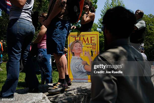 Magazine cover mock up is held by a Democratic presidential hopeful U.S. Senator Hillary Clinton supporter during her campaign event at Shepherd...