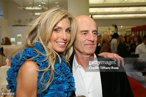 Actress Heather Thomas and husband Skip Brittenham pose at her Launch Party for Heather Thomas' Debut Novel "Trophies" at Barney's in Beverly Hills...