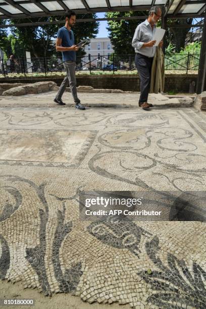 Visitors walk in the Archaeological area of Santa Croce in Gerusalemme, in the new Domus Costantiniane, three belonging environments to the residence...