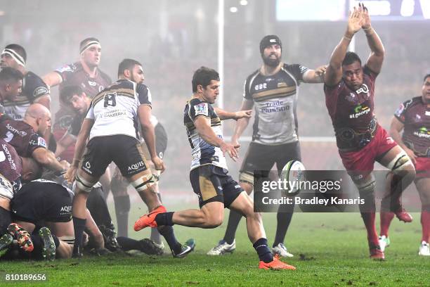 Tomas Cubelli of the Brumbies gets a kick away during the round 16 Super Rugby match between the Reds and the Brumbies at Suncorp Stadium on July 7,...