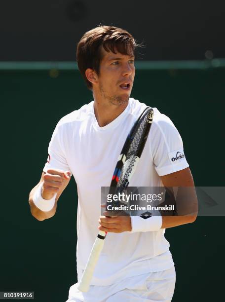 Aljaz Bedene of Great Britain celebrates during the Gentlemen's Singles third round match against Gilles Muller of Luxembourg on day five of the...