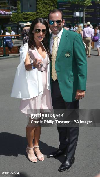 Golfer Sergio Garcia and Angela Akins arrive on day five of the Wimbledon Championships at the All England Lawn Tennis and Croquet Club, Wimbledon.