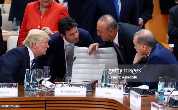 President of Turkey Recep Tayyip Erdogan talks with US President Donald Trump , accompanied by Foreign Affairs Minister of Turkey Mevlut Cavusoglu ,...