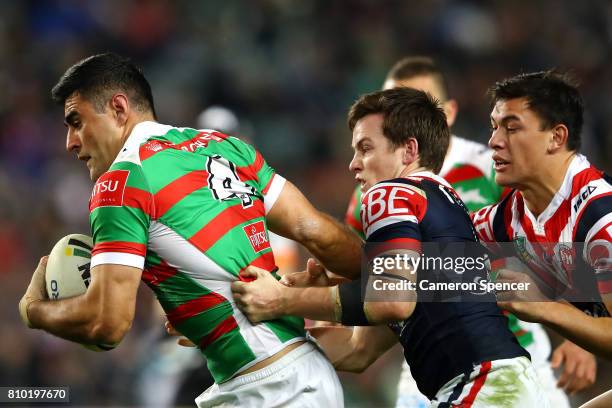 Bryson Goodwin of the Rabbitohs runs the ball during the round 18 NRL match between the Sydney Roosters and the South Sydney Rabbitohs at Allianz...