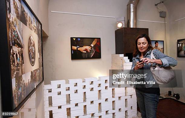 Barbara Palombelli attends the "Casualties of the Nameless" Opening Exhibition by Italian photographer Marco Di Lauro held at MO.C.A. Studio on May...