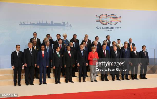 International leaders attend the group photo on the first day of the G20 economic summit on July 7, 2017 in Hamburg, Germany. The G20 group of...