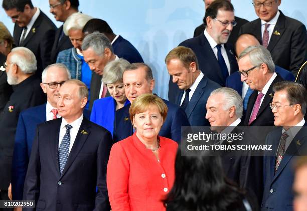 Russia's President Vladimir Putin, Britain's Prime Minister Theresa May, Turkey's President Recep Tayyip Erdogan, German Chancellor Angela Merkel,...