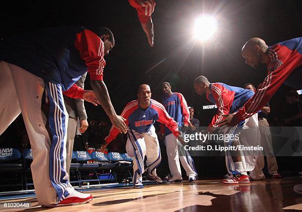 Chauncey Billups of the Detroit Pistons greets his teammates as he enters the court during player introductions prior to Game Two of the Eastern...