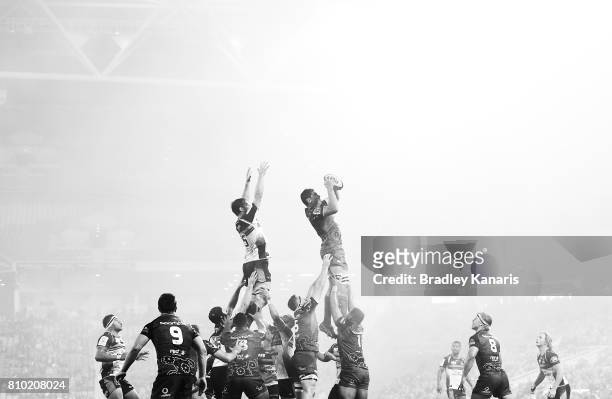 Rob Simmons of the Reds competes at the lineout as a blanket of fog can be seen during the round 16 Super Rugby match between the Reds and the...