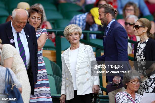 David Beckham and Sandra Beckham look on from the centre court royal box on day five of the Wimbledon Lawn Tennis Championships at the All England...