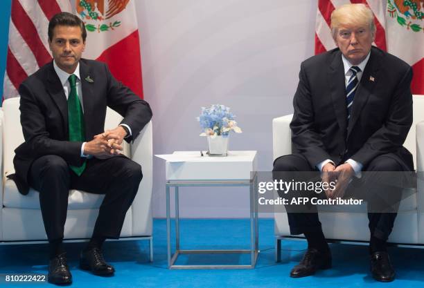 President Donald Trump and Mexican President Enrique Pena Nieto hold a meeting on the sidelines of the G20 Summit in Hamburg, Germany, on July 7,...