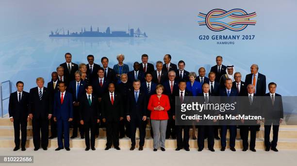 International leaders attend the group photo on the first day of the G20 economic summit on July 7, 2017 in Hamburg, Germany. The G20 group of...