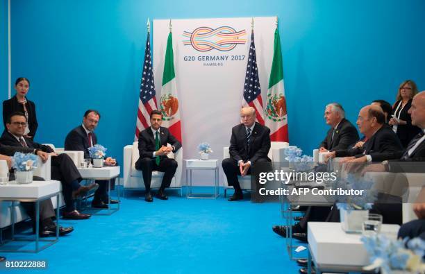 President Donald Trump and Mexican President Enrique Pena Nieto hold a meeting on the sidelines of the G20 Summit in Hamburg, Germany, on July 7,...