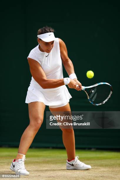 Ana Konjuh of Croatia plays a backhand during the Ladies Singles third round match againgst Dominika Cibulkoba of Slovakia on day five of the...