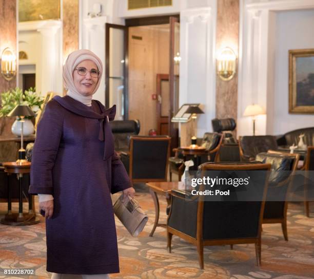 Emine Erdogan, wife of Recep Tayyip Erdogan, President of the Republic of Turkey, walks through the lobby of the Atlantic Hotel as she takes part in...