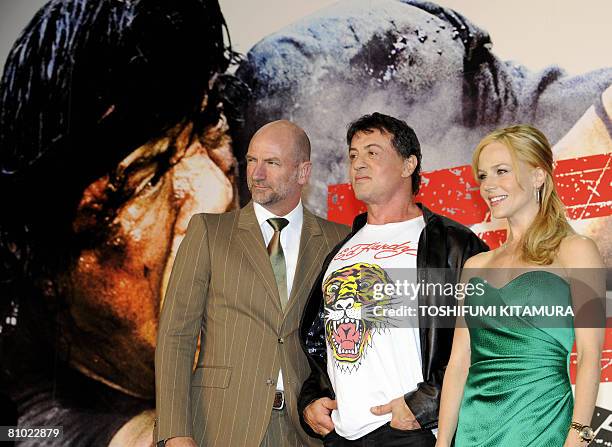 Actor Sylvester Stallone aarives with British actor Graham McTavish and US actress Julie Benz for the premiere of their latest movie, "Rambo" in...