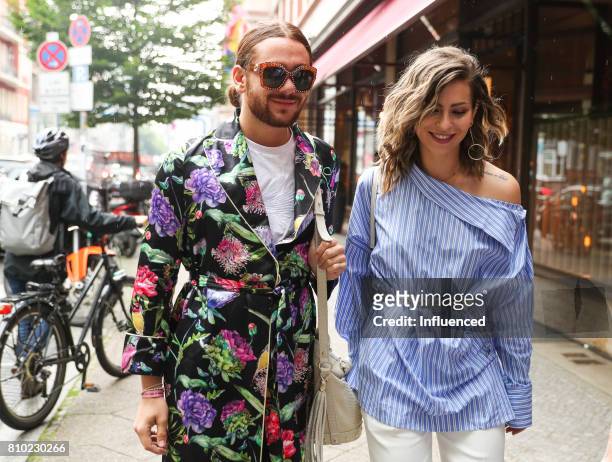 Riccardo Simonetti and Masha Sedgwick seen arriving at the Gala Fashion Brunch Ellington Hotel on July 7, 2017 in Berlin, Germany.