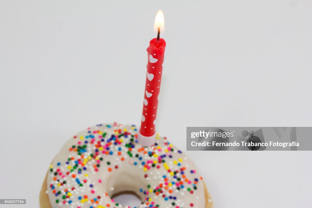Celebrating the anniversary with colorful donut