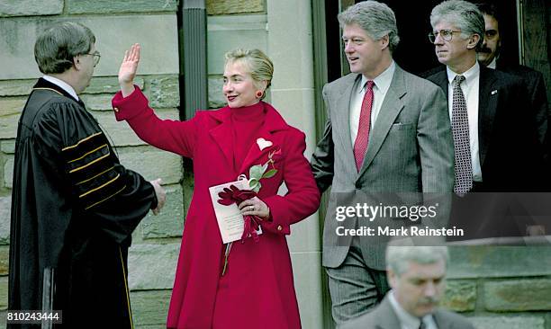 First Lady Hillary Clinton and President Bill Clinton wave as they leave the First Baptist Church of the City of Washington DC after a service,...