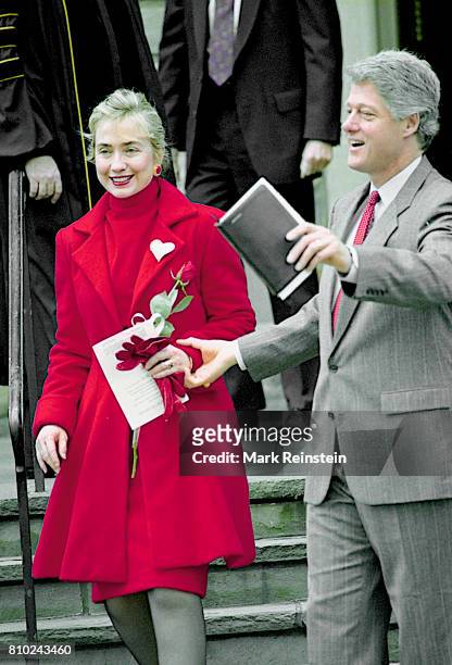 First Lady Hillary Clinton and President Bill Clinton smile as they leave the First Baptist Church of the City of Washington DC after a service,...