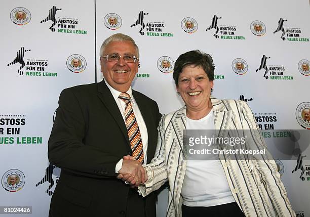 President Theo Zwanziger of the German Football Assiciation shakes hands with the minister of justice of North Rhine-Westphalia Roswitha...