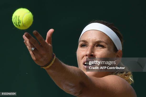 Slovakia's Dominika Cibulkova serves against Croatia's Ana Konjuh during their women's singles third round match on the fifth day of the 2017...