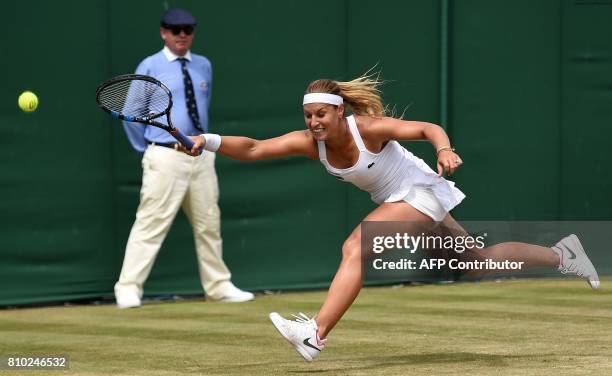 Slovakia's Dominika Cibulkova returns against Croatia's Ana Konjuh during their women's singles third round match on the fifth day of the 2017...